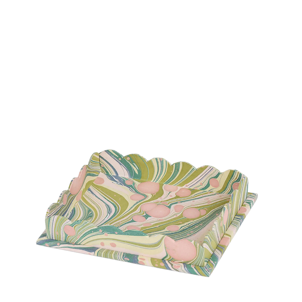 marbled tray with a green and pink abstract pattern on a white background