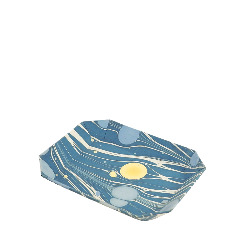 Marble-patterned tray with celestial marbled design on a white background