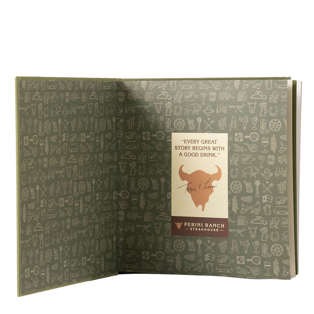 An open book or booklet with olive green pages covered in small white line drawings of various objects and symbols. A central cream label reads, "Every great story begins with a good drink.