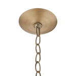 A close-up of a ceiling light fixture's round brushed brass ceiling canopy connected to a matching metal chain, shown against a plain white background.