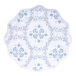 Decorative placemat with blue floral patterns on a white background