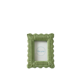 Green wicker picture frame on a white background