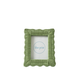 Green wicker picture frame with 'blue print' branding on a white background
