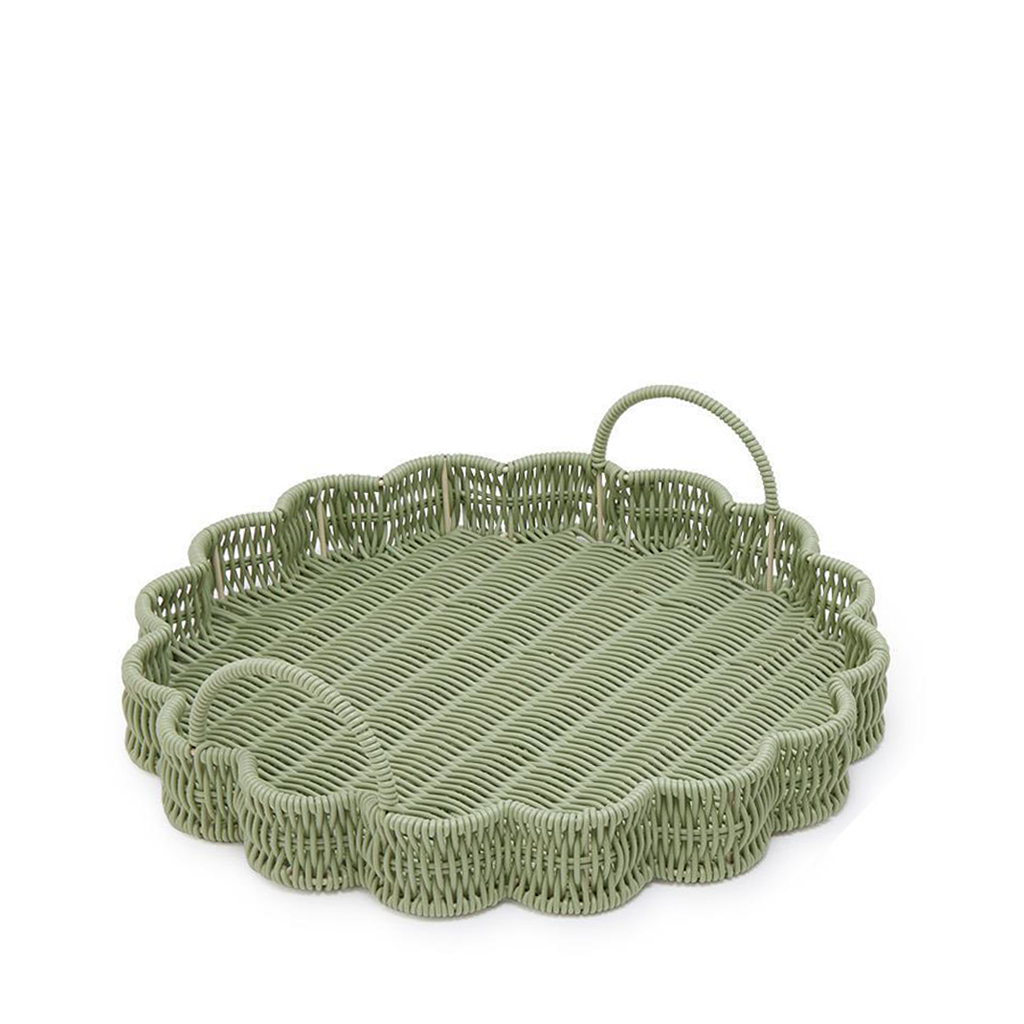 Green wicker tray with scalloped edge and handle on a white background