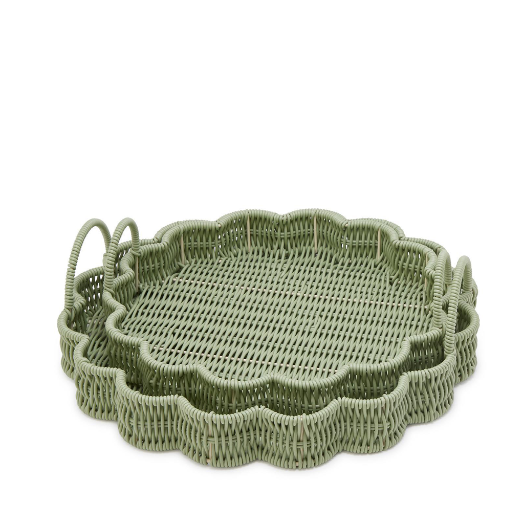 Set of two green woven trays on a white background