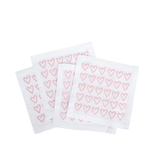 Set of 4 half hearted cocktail napkins with pink embroidered hearts