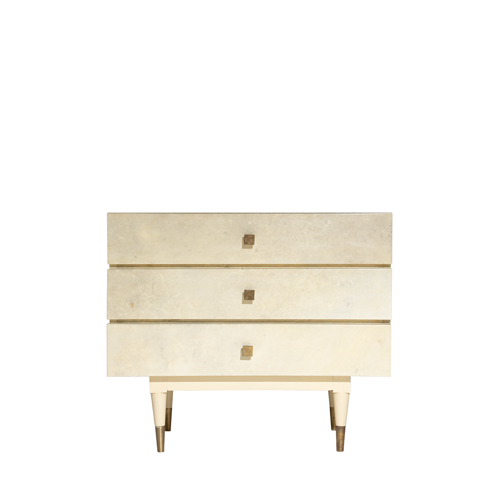 Beige dresser with gold accents on a white background