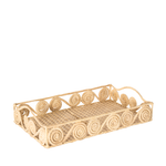 Decorative wicker tray with intricate patterns on a white background