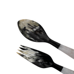 Black and white patterned spoon and fork set on a white background