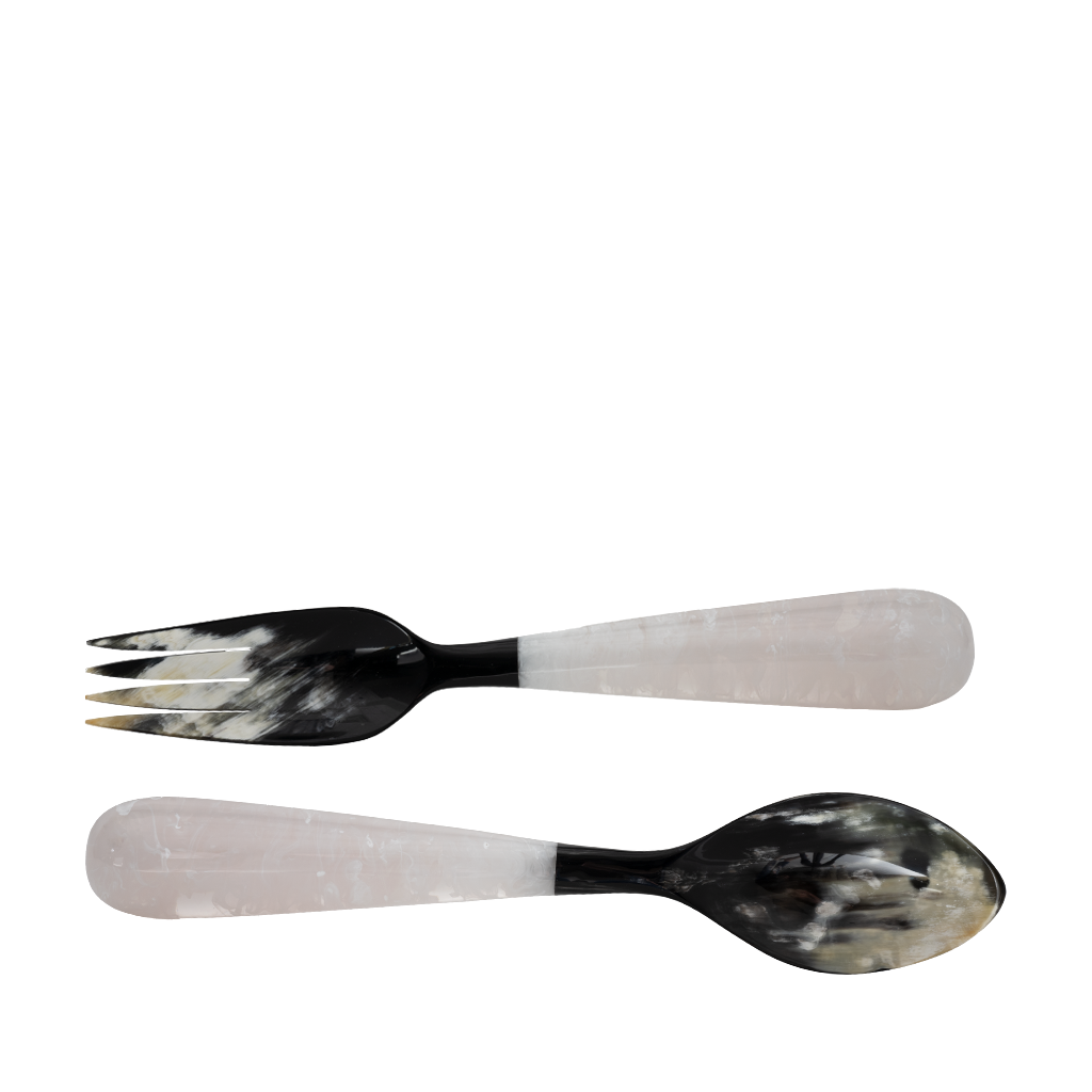 Set of black and white patterned spoon and fork on a white background