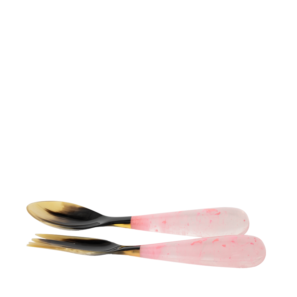Set of two spoons with pink and black handles on a white background