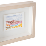 A framed abstract watercolor art print in a light natural wood shadowbox frame, shown against a clean white background.