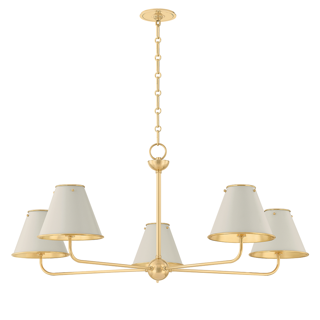 A five-light chandelier with a polished gold/brass-finished metal frame and five tapered off-white fabric shades, suspended by a chain from a round ceiling canopy.