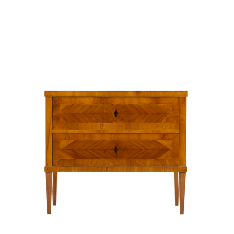 Moore Chest. A wooden chest with 2 drawers in total. It has a harringbone wooden design on the drawers and top of the chest