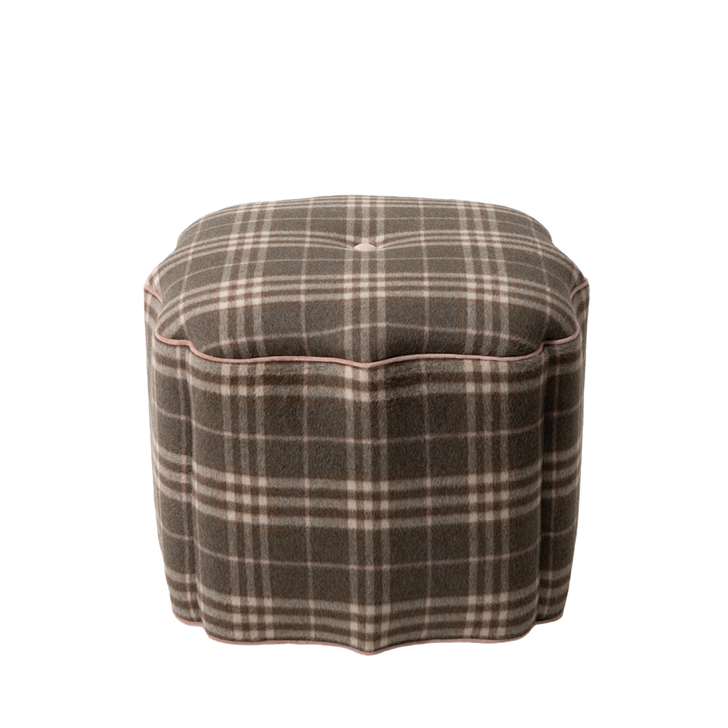 Plaid patterned ottoman on a white background