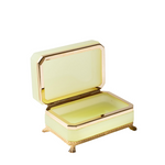 Decorative box with gold trim on a white background