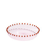 Pink glass platter with red pearls