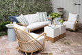 Patio with loveseat, chairs, and tables