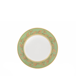 Decorative plate with gold leaf design on a white background