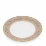 Decorative plate with gold floral patterns on a white background