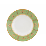 Green ceramic plate with gold floral patterns on a white background