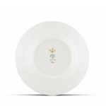White ceramic plate with a gold emblem on a white background