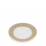 Decorative plate with gold floral pattern on a white background