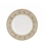 Decorative plate with gold leaf pattern on a white background