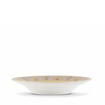 White bowl with gold decorative elements on a white background