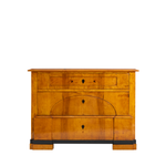 Rene Chest. A wooden chest with 1 skinny top drawer and 2 drawers below. It has a black stripe just above the feet of the chest