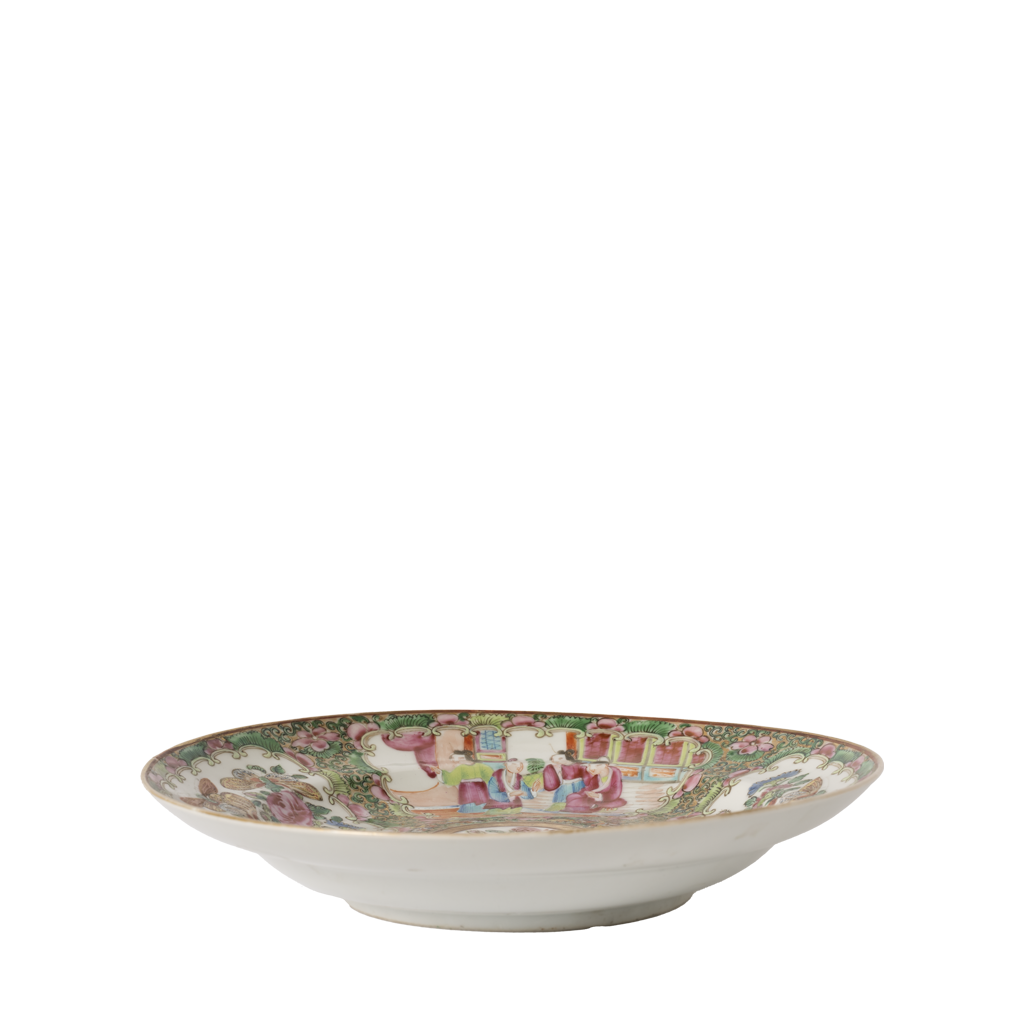 Decorative ceramic bowl with colorful patterns on a white background