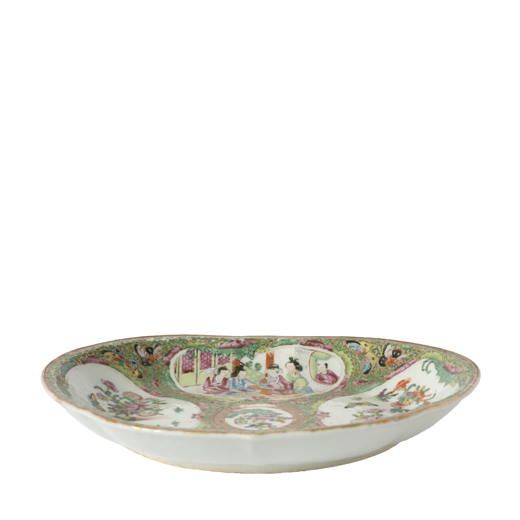 Decorative ceramic bowl with colorful patterns on a white background