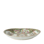 Decorative ceramic bowl with colorful patterns on a white background