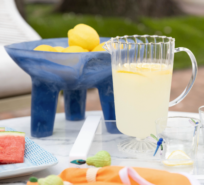 clear pitcher with lemonade