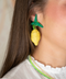 lemon earrings being worn