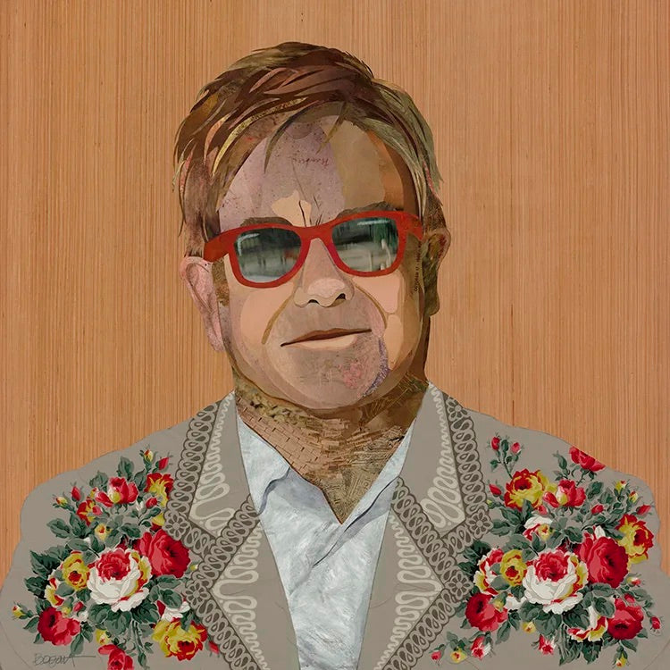 A stylized portrait painting of Elton John wearing red-framed sunglasses and a gray patterned jacket adorned with red, yellow, and white floral bouquets, set against a light wood-grained background.