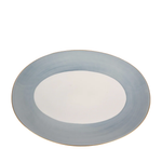 Round ceramic plate with a light blue rim on a white background