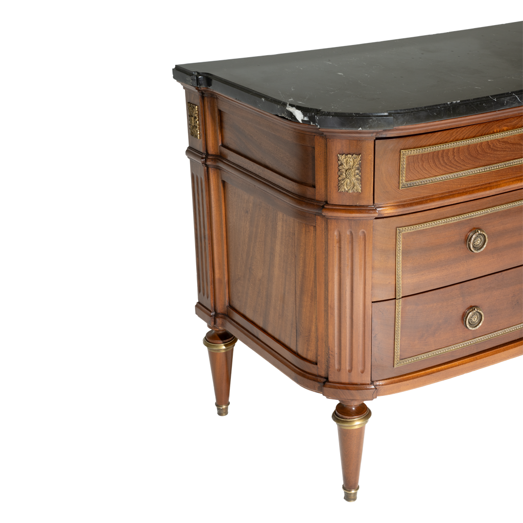 Wooden dresser with marble top on a white background