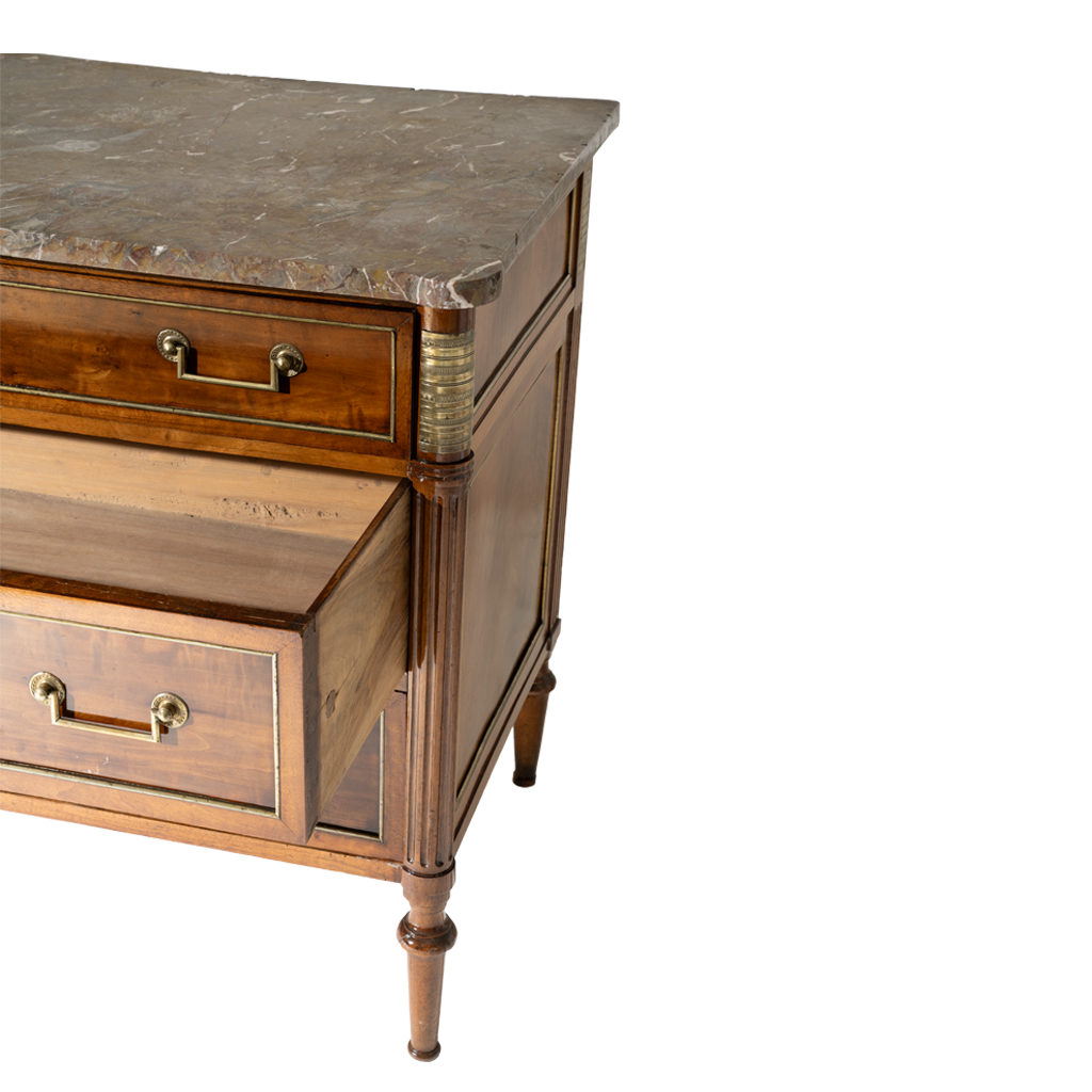 Wooden dresser with marble top on a white background