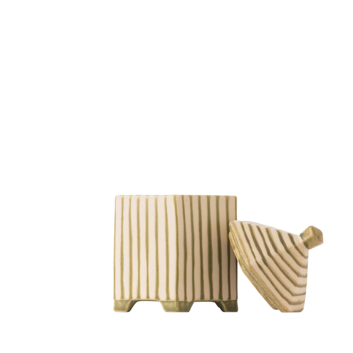 A small decorative ceramic planter with a matching lid, featuring vertical gold stripes on a cream-colored glaze, set against a plain white background.