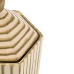 Close-up of a ceramic container with a ribbed lid and fluted body, featuring a cream glaze with textured olive-green stripes, set against a plain white background.