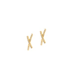Gold and diamond cross earrings on a white background.