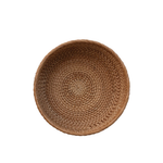 Woven brown basket on a white background