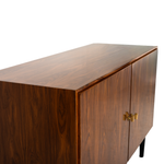 Wooden sideboard with gold handles on a white background