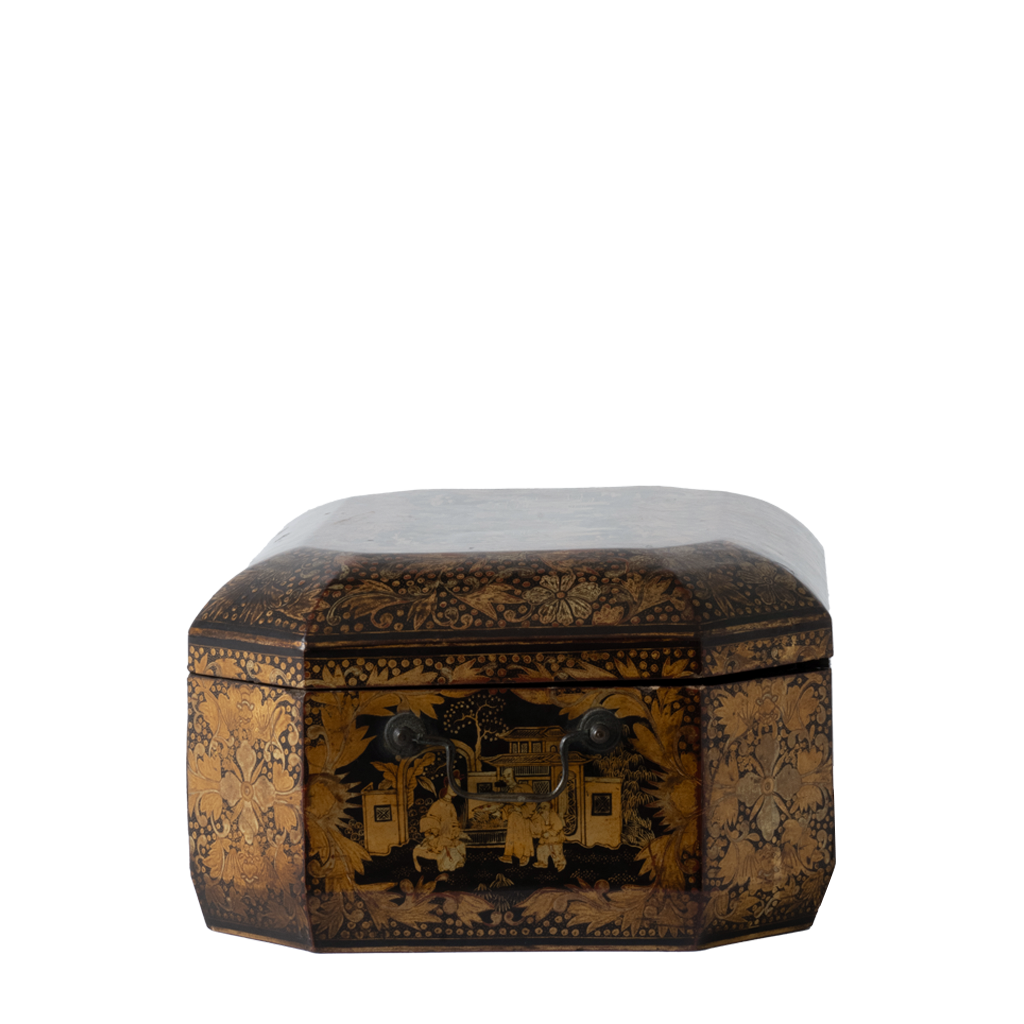 A small octagonal lacquered wooden box with a dark brown and gold floral pattern, featuring hand-painted figures on the front panel and a light gray lid, shown against a plain white background.