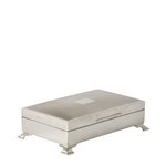 A rectangular silver-toned metal box with a hinged lid, small feet, and a central handle, shown on a plain white background.