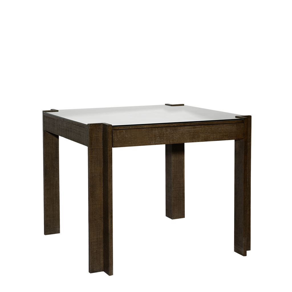 Square table with dark brown wooden legs and a glass top on a white background