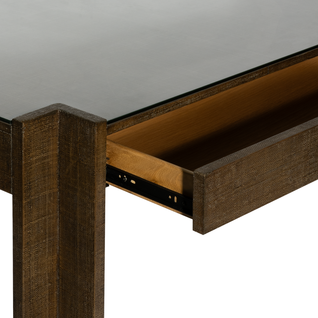 Wooden drawer with glass top on a plain background