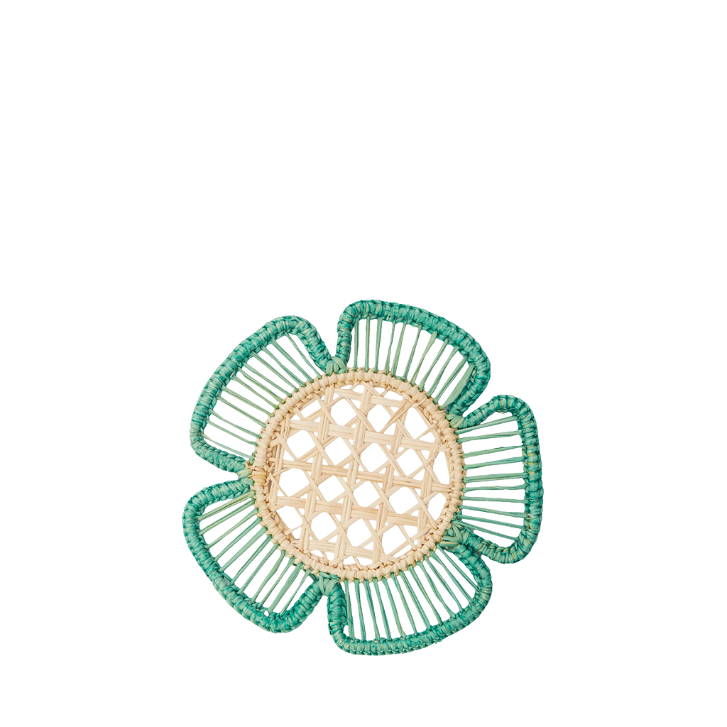 Floral-shaped woven coaster with green and beige colors on a white background
