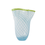 Blue glass vase with green rim on a white background